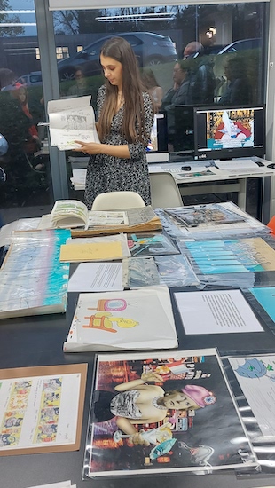 Elly Ekrem with work that was used as part of the Animating Farnham project