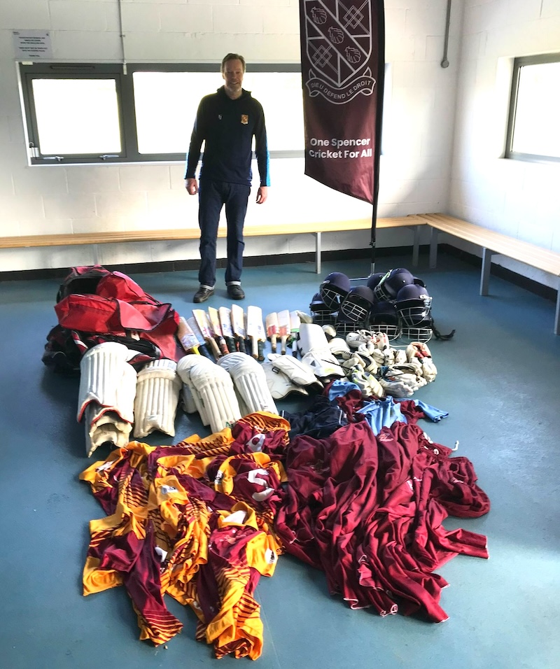 Jamie Greig, SCC Managing Director, with cricket gear donations